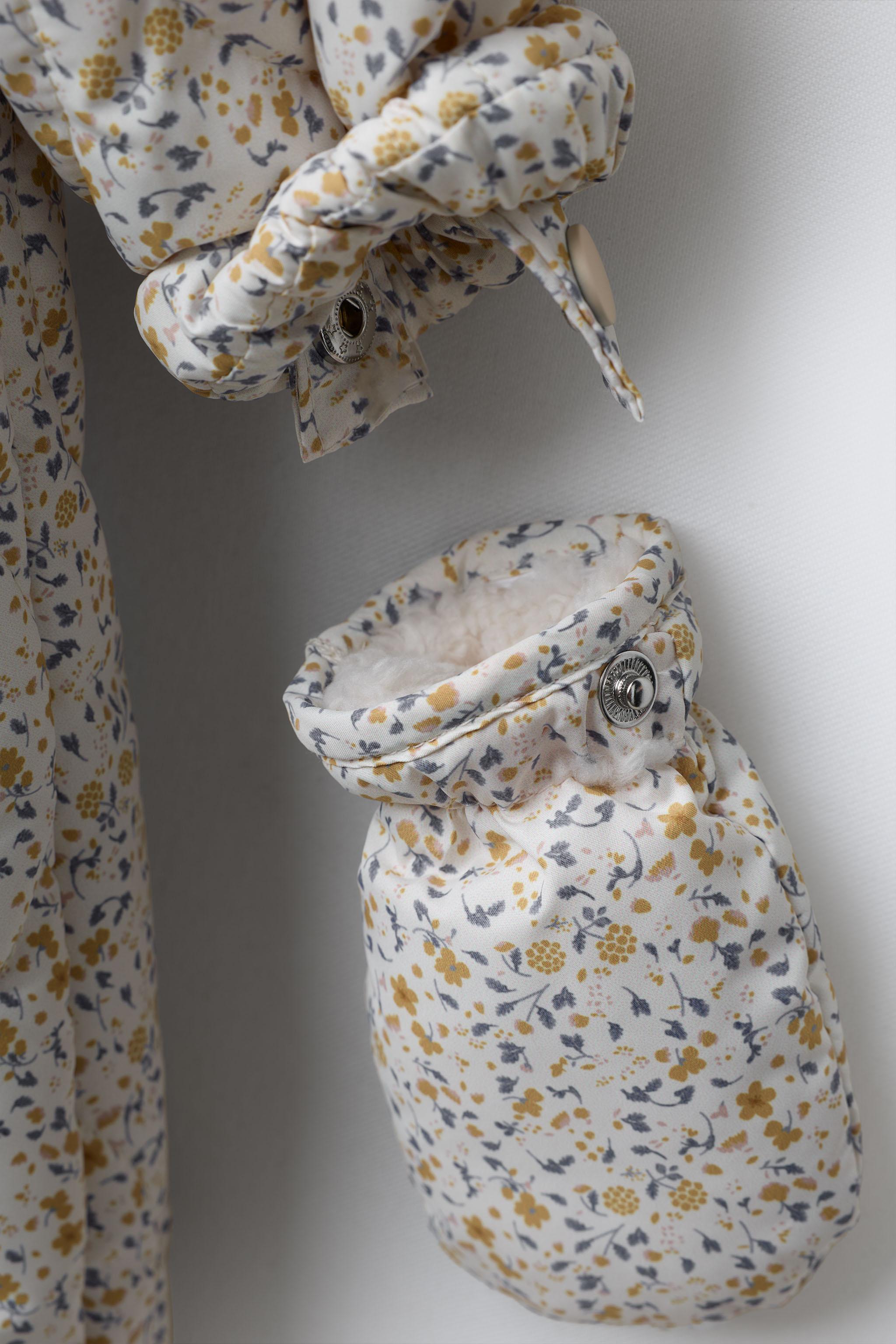 NYLON ROMPER WITH DETACHABLE MITTENS AND BOOTIES, FLORAL PRINT